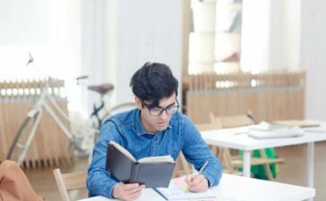 Boy doing paper work