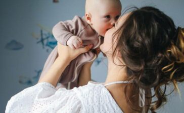 baby with mother