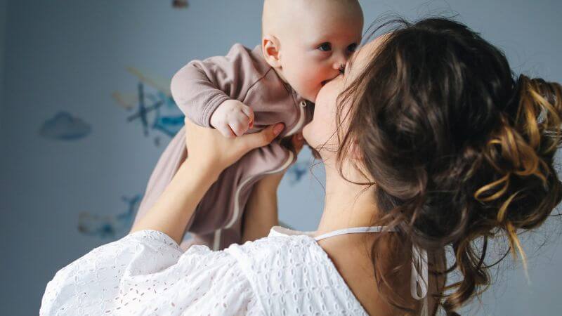 baby with mother