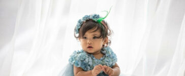 Baby girl with blue frock