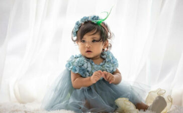 Baby girl with blue frock