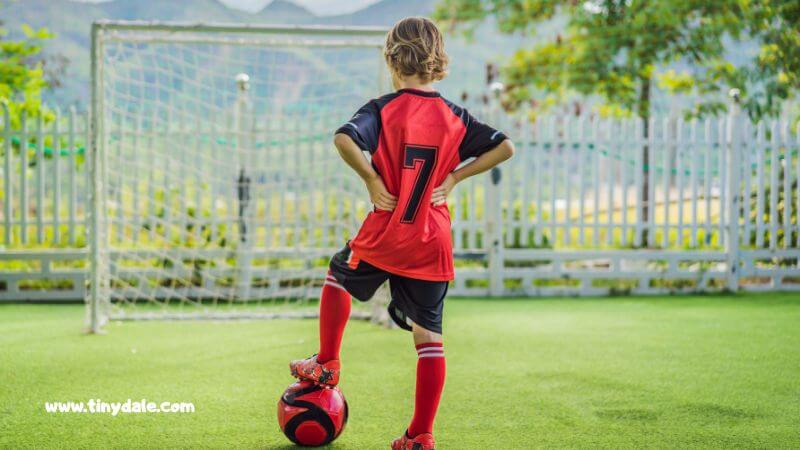 Kid playing football