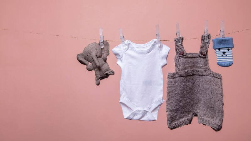 baby clothes hanging