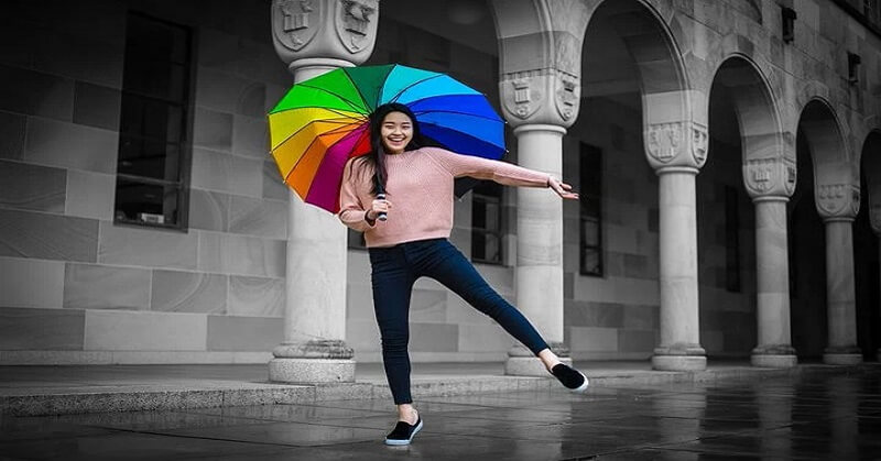 Girl holding umbrella